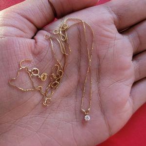 10k gold and diamond chain and pendant